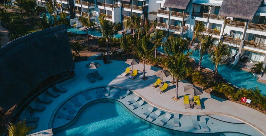 Sunrise_Attitude_(Adults_Only)_an_aerial_view_of_a_resort_with_a_swimming_pool_at_Sunrise_Attitude_(Adults_Only)_in_Belle_Mare_(1)